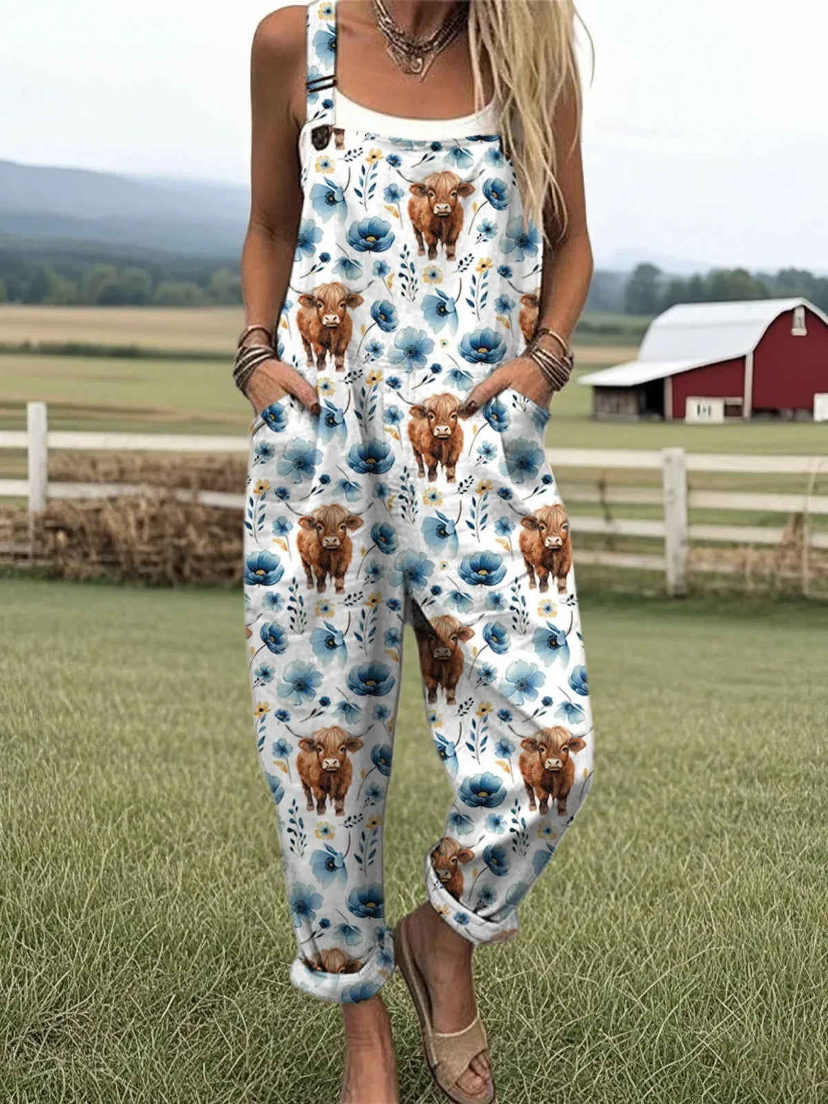 Mono de pernera ancha en algodón y lino con estampado de vacas y flores