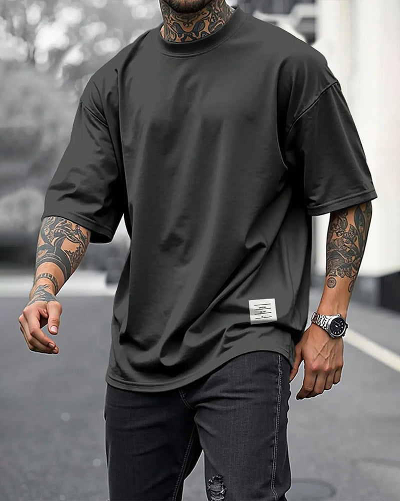 Manuel Jesus-Camisetas holgadas con etiqueta