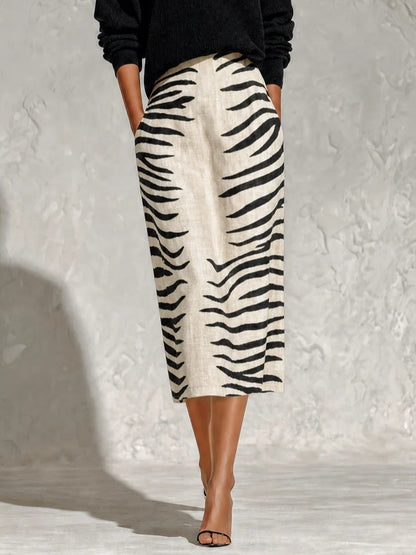 Colette | Conjunto de jersey cuello pico y falda midi cebra