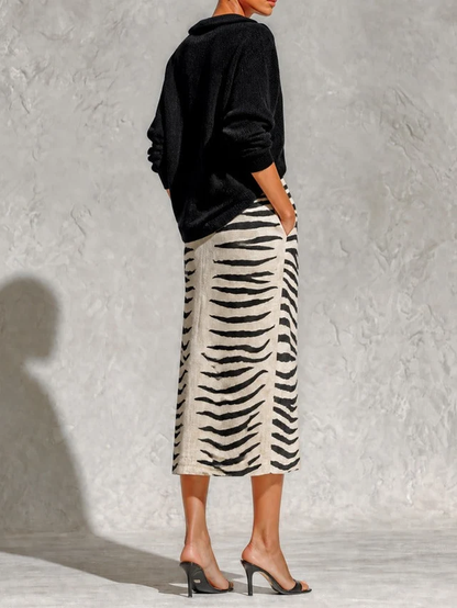 Colette | Conjunto de jersey cuello pico y falda midi cebra