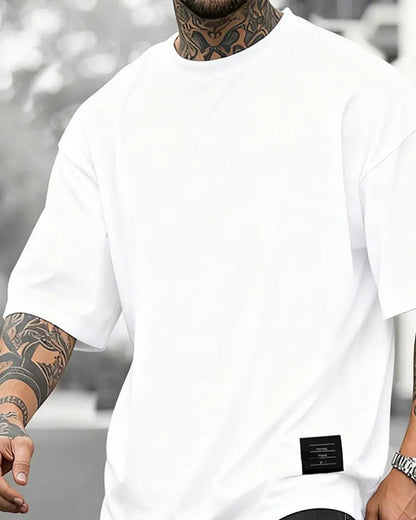 Manuel Jesus-Camisetas holgadas con etiqueta